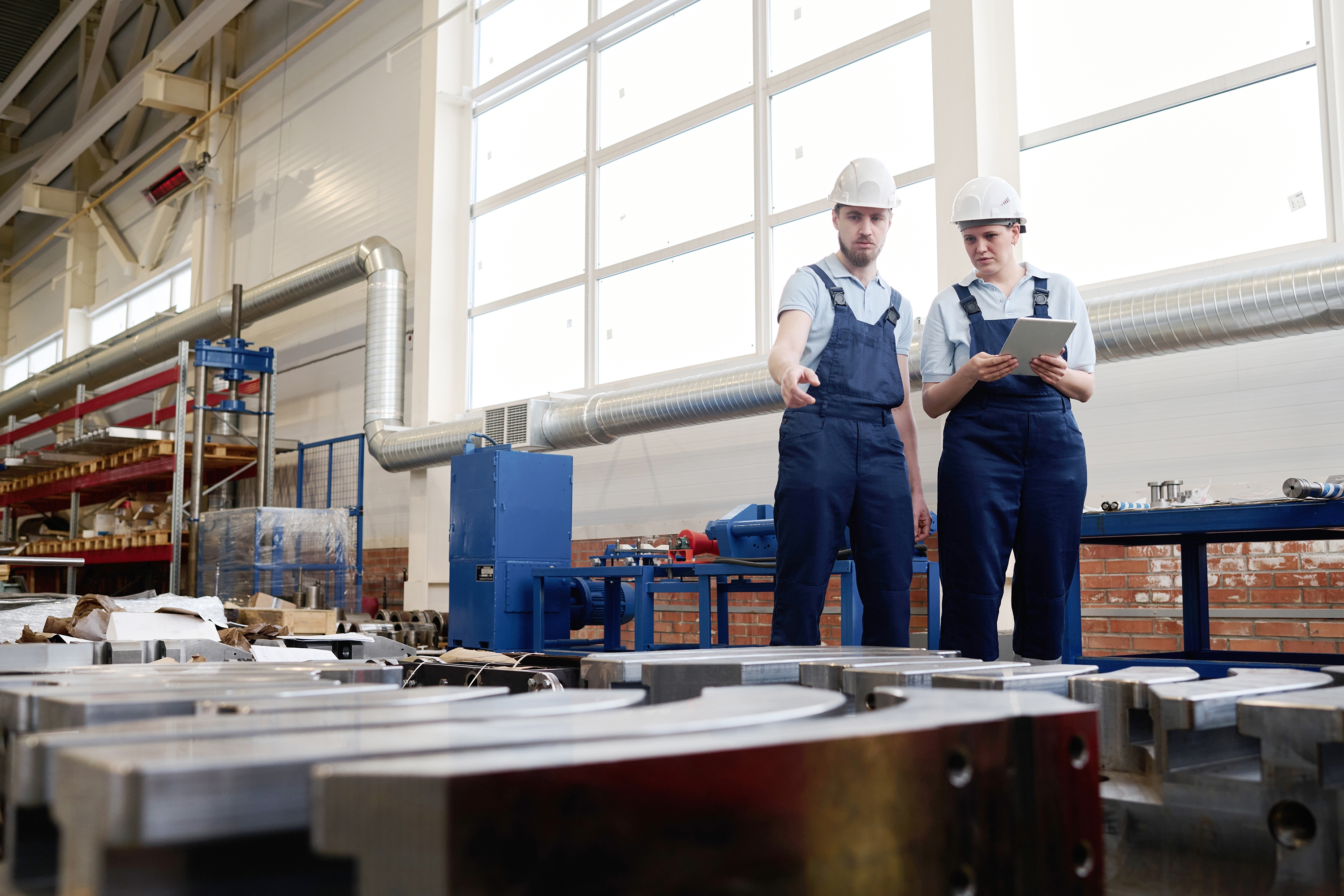 Industrial team monitoring factory operations