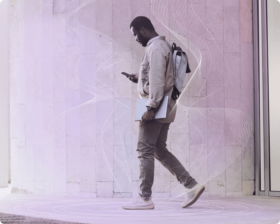 Man using phone to navigate with white overlay